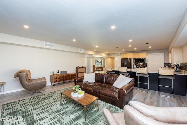 living room with light wood-type flooring