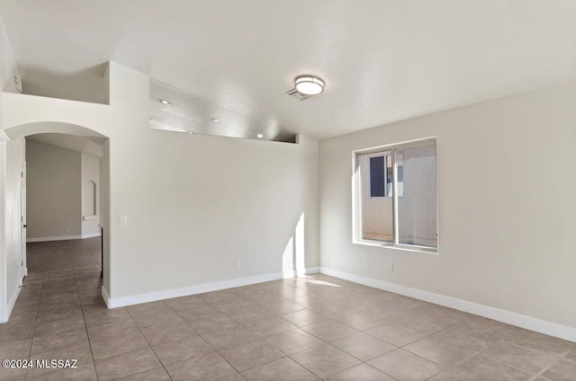 view of tiled spare room