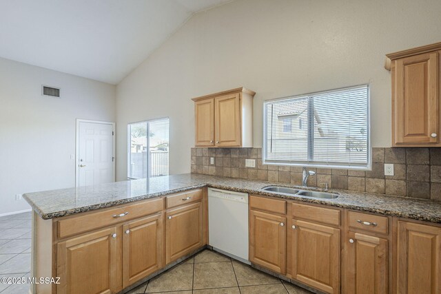 bathroom with vanity and tiled shower / bath combo