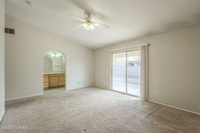 carpeted empty room with ceiling fan