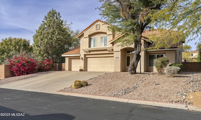 view of front of property with a garage