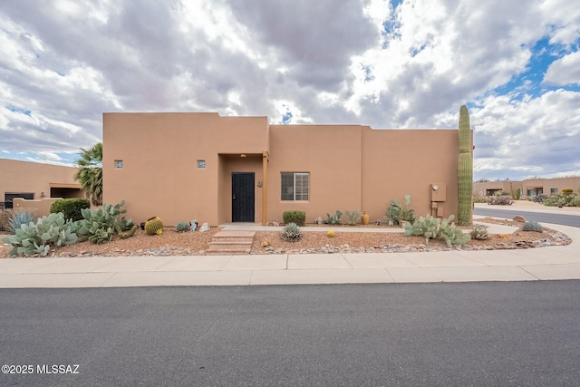 view of pueblo-style home