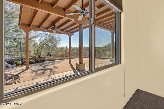 view of patio featuring ceiling fan