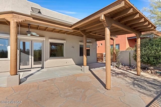 view of patio / terrace featuring ceiling fan and french doors