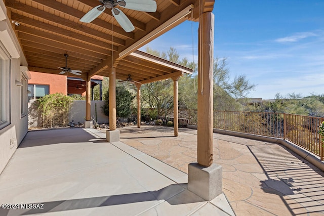 view of patio featuring ceiling fan