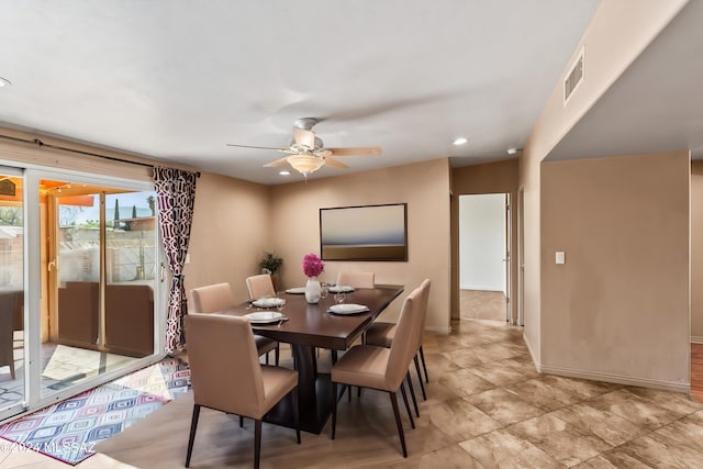 dining space with ceiling fan