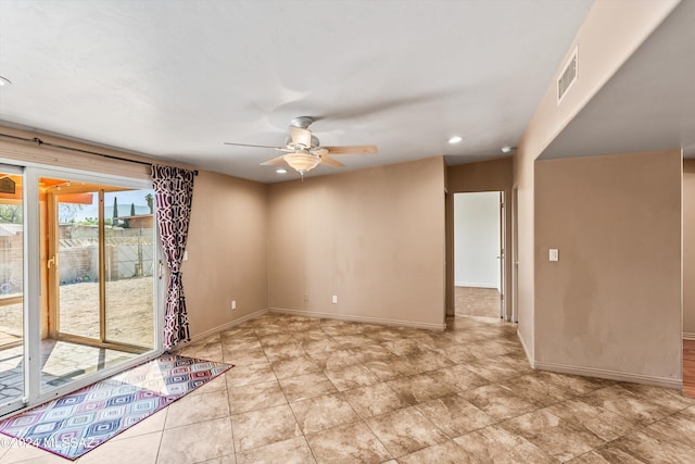 unfurnished room with ceiling fan