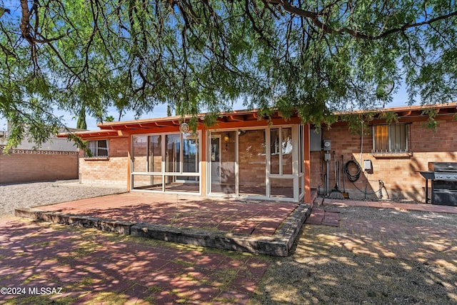 rear view of house with a patio area