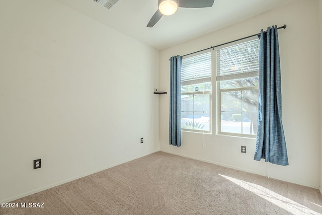 6551 E Via Arroyo Largo, Tucson, AZ 85756 - empty room with carpet flooring, a ceiling fan, and baseboards