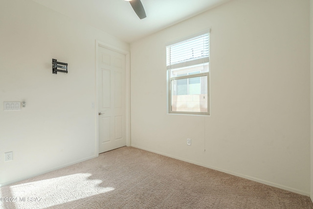 6551 E Via Arroyo Largo, Tucson, AZ 85756 - spare room featuring carpet floors, ceiling fan, and baseboards