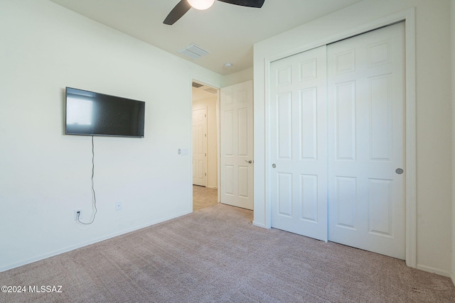 6551 E Via Arroyo Largo, Tucson, AZ 85756 - unfurnished bedroom with carpet, a closet, ceiling fan, and baseboards