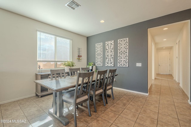6551 E Via Arroyo Largo, Tucson, AZ 85756 - dining room with light tile patterned floors, recessed lighting, and baseboards
