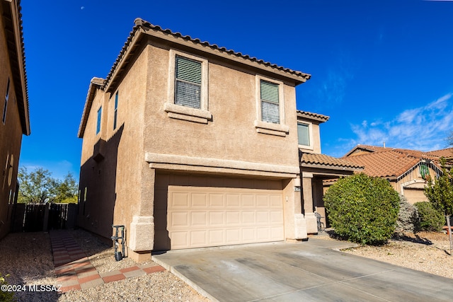 view of front of home with a garage