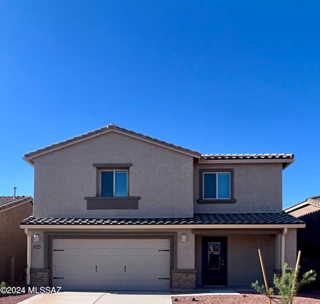 view of front of home featuring a garage