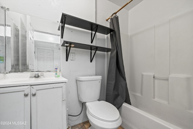 full bathroom with vanity, toilet, and shower / tub combo