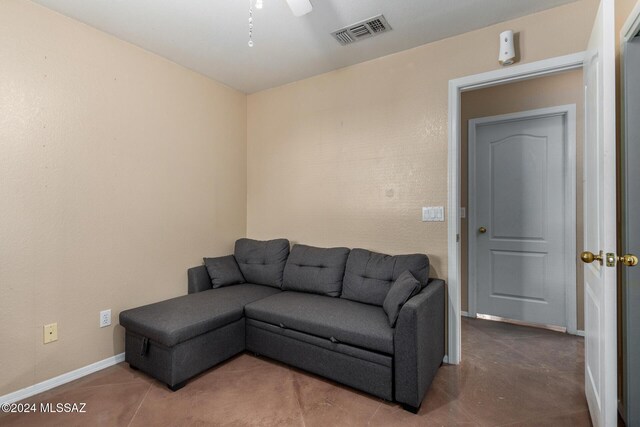 living room featuring ceiling fan