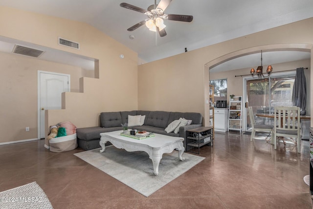 living room featuring ceiling fan with notable chandelier and vaulted ceiling