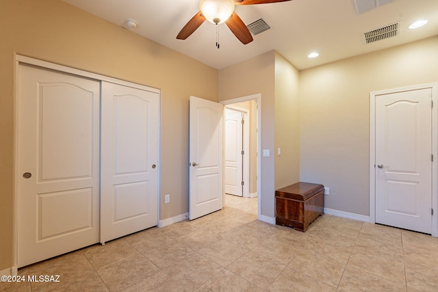 unfurnished bedroom featuring visible vents and baseboards