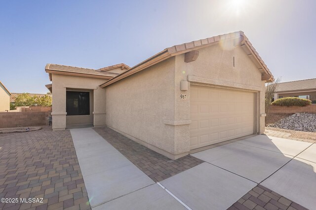 view of front of property featuring a garage