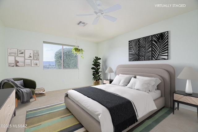 4594 S Moon River Pl, Green Valley, AZ 85622 - bedroom featuring light tile patterned flooring and ceiling fan