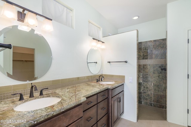 4594 S Moon River Pl, Green Valley, AZ 85622 - full bathroom featuring double vanity, a walk in shower, and tile patterned floors