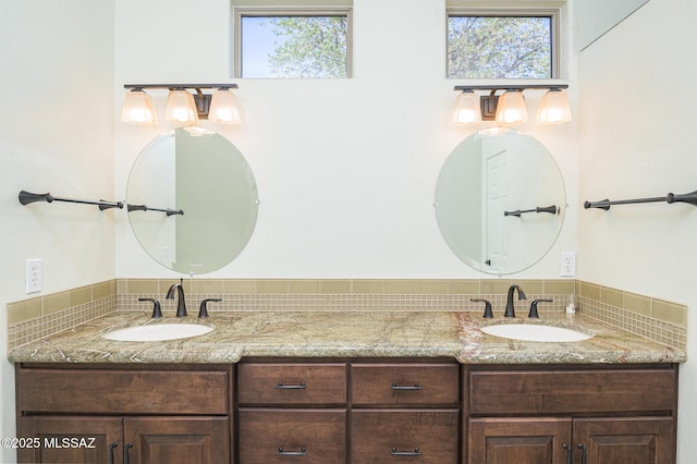 4594 S Moon River Pl, Green Valley, AZ 85622 - bathroom featuring double vanity and healthy amount of natural light