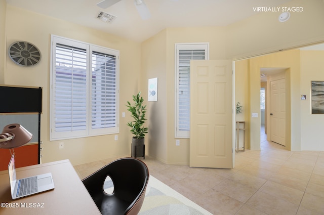 4594 S Moon River Pl, Green Valley, AZ 85622 - home office with ceiling fan and light tile patterned floors