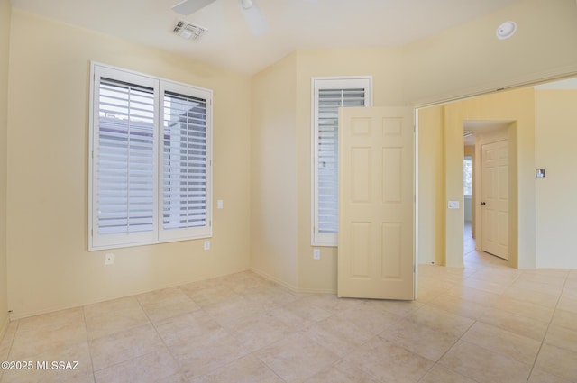 4594 S Moon River Pl, Green Valley, AZ 85622 - spare room featuring ceiling fan and light tile patterned floors
