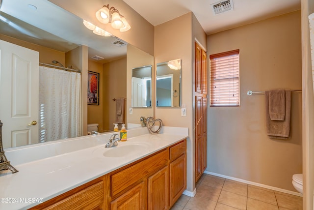 full bathroom featuring visible vents, toilet, and tile patterned floors