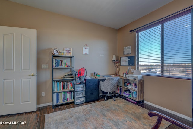 home office featuring baseboards and wood finish floors