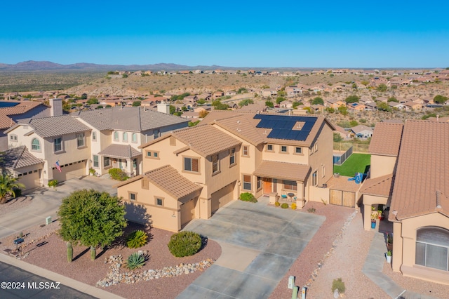 bird's eye view featuring a residential view and a mountain view