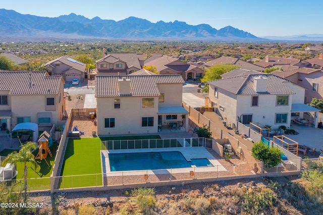 bird's eye view featuring a mountain view and a residential view