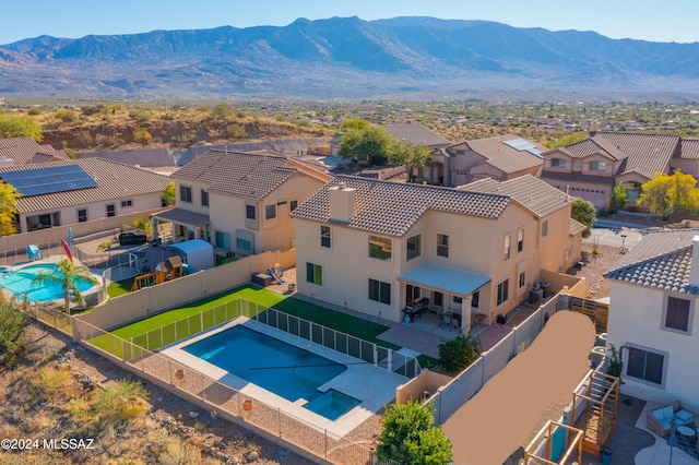 aerial view featuring a residential view and a mountain view