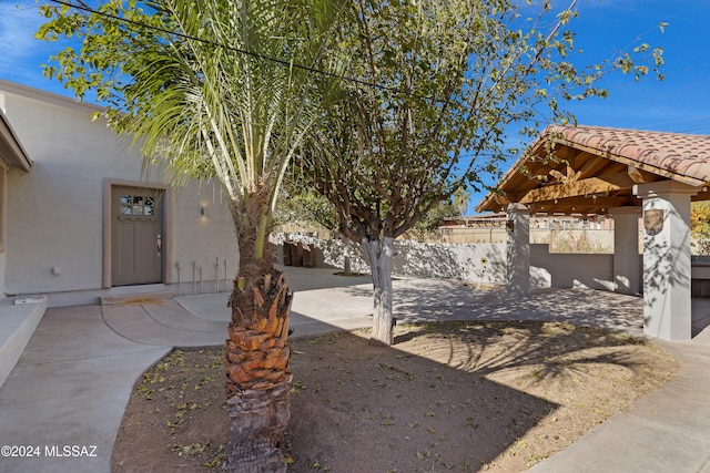 view of yard featuring a gazebo and a patio