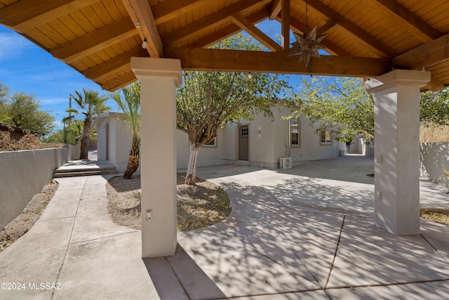 view of patio / terrace featuring a gazebo and ceiling fan