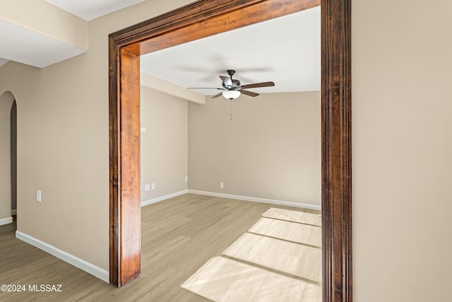 empty room featuring light hardwood / wood-style floors and ceiling fan