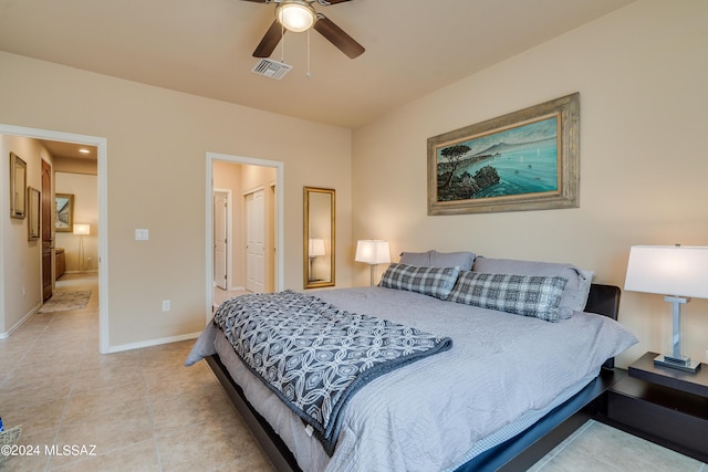 bedroom featuring ceiling fan and light tile patterned floors