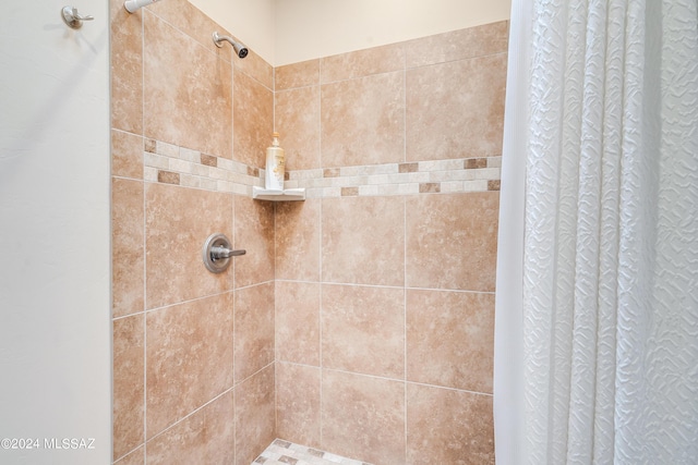 bathroom featuring curtained shower