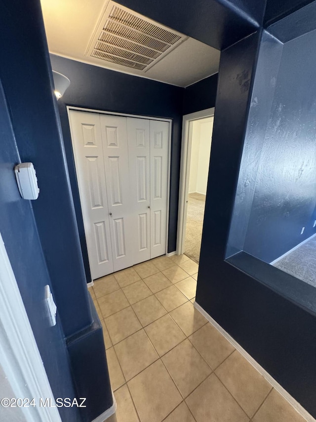 bathroom with tile patterned flooring