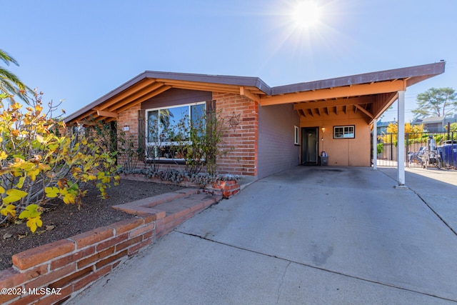 view of front facade featuring a carport