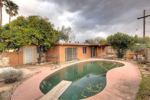 view of pool featuring a patio area