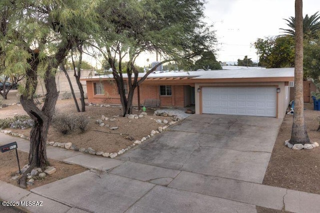 ranch-style home with a garage