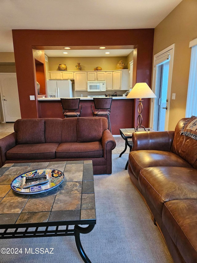 living room featuring carpet flooring