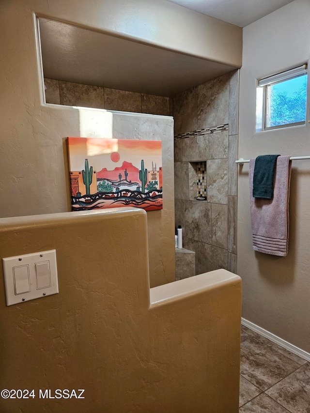 bathroom with tile patterned floors