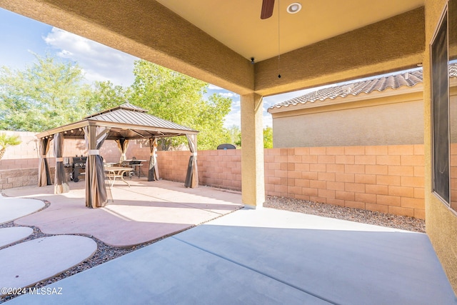 view of patio featuring a gazebo and ceiling fan