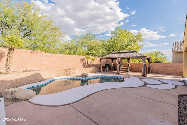 view of pool featuring a gazebo and a patio