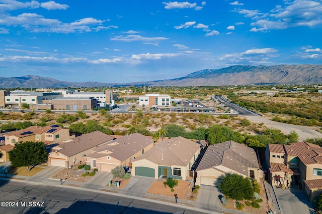 drone / aerial view featuring a mountain view