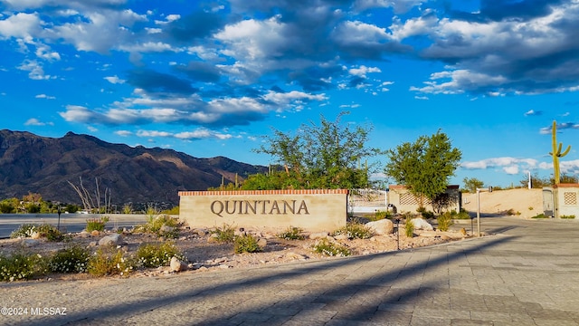 community sign featuring a mountain view