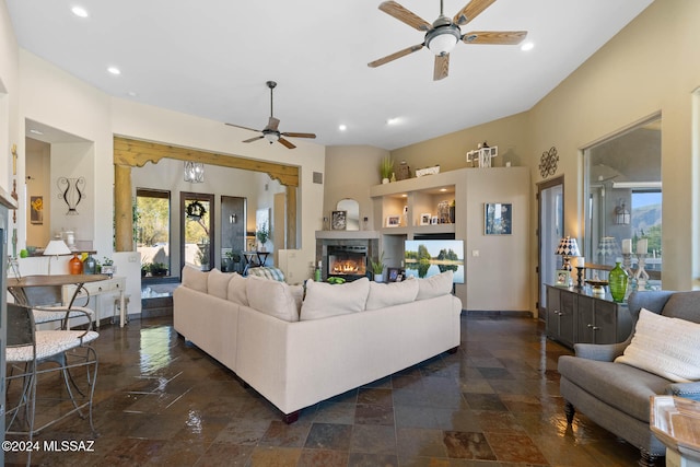 living room featuring ceiling fan