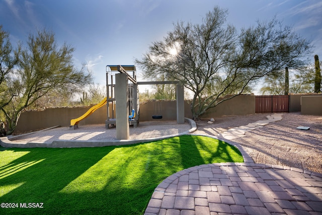 view of yard with a playground